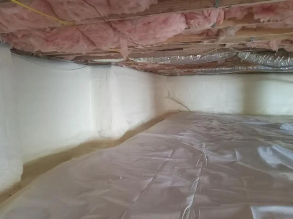 Crawl space encapsulation with closed-cell spray foam for Commercial Roof Restoration in York